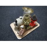 A tray of vintage scales and weights, converted Duplex oil lamp, hand bell,