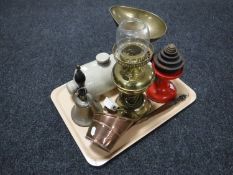 A tray of vintage scales and weights, converted Duplex oil lamp, hand bell,