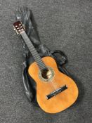 A Jose Ferrer acoustic guitar in carry bag and a Jose Ferrer child's guitar in carry bag