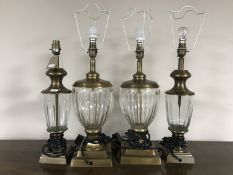 Two pairs of metal and cut glass table lamps