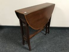 A Victorian inlaid mahogany drop leaf table