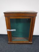 A Victorian inlaid mahogany curio cabinet