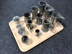 A tray of continental pewter tankards,
