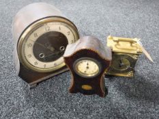 A brass cased Smiths carriage clock with key together with a Victorian inlaid mahogany clock and an