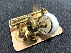 A tray of two pairs of continental brass wall mounted oil lamps,