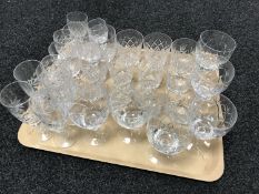 A tray of assorted lead crystal drinking glasses