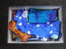 A box of silk scarves and similar items