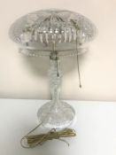 An early twentieth century cut glass mushroom table lamp with shade