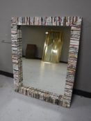 A contemporary paper framed mirror