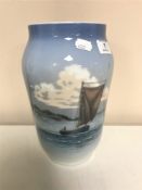 A Royal Copenhagen vase decorated with a sailing boat,
