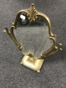 An early 20th century brass framed dressing table mirror