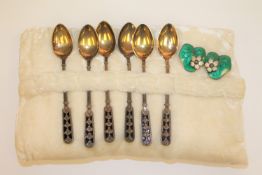 Six silver gilt black enamel spoons by David Andersen and a pair of silver two-colour enamel