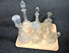 Six various glass decanters and a cut glass ewer