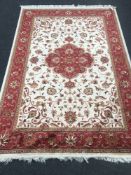 A Keshan carpet 230 cm x 160 cm