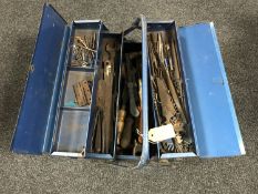 A metal concertina tool box and tools