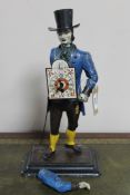 An antique Continental metal figural clock - Man with top hat