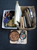 A box containing dolls of the world together with another box of assorted framed picture,