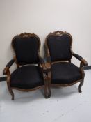 A pair of Continental walnut salon chairs, width 60 cm.