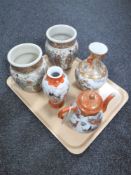 A tray of five pieces of 20th century Japanese porcelain comprising four vases and a teapot