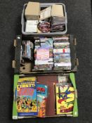 Two crates and a box of CDs and DVDs, annuals including The Broons, Topper,
