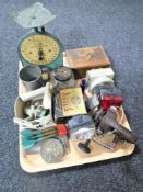 A tray of Chinese puzzle box, set of vintage Weight Well scales, bike lights, fishing reels, darts,