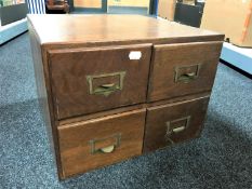 An oak four drawer index chest