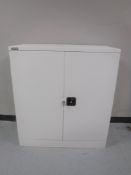 A Dams double door metal stationary cabinet with keys