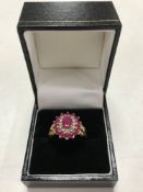 A 9ct gold synthetic ruby cluster ring, size P.