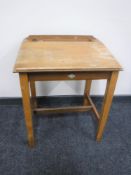 A mid 20th century school desk