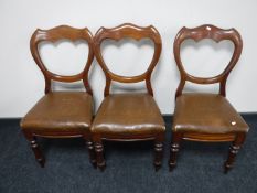 A set of three mahogany dining chairs