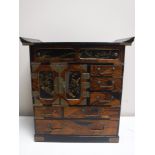 A Japanese Meiji period lacquered table cabinet
