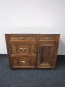 A late nineteenth century marble topped wash stand fitted four drawers and a cupboard beneath