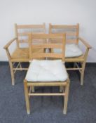 A pair of twentieth century pine rush seated armchairs,