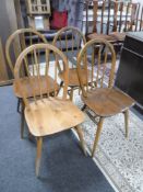 A set of four Ercol dining chairs