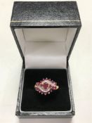 A 9ct gold synthetic ruby and diamond set dress ring, size P/Q.