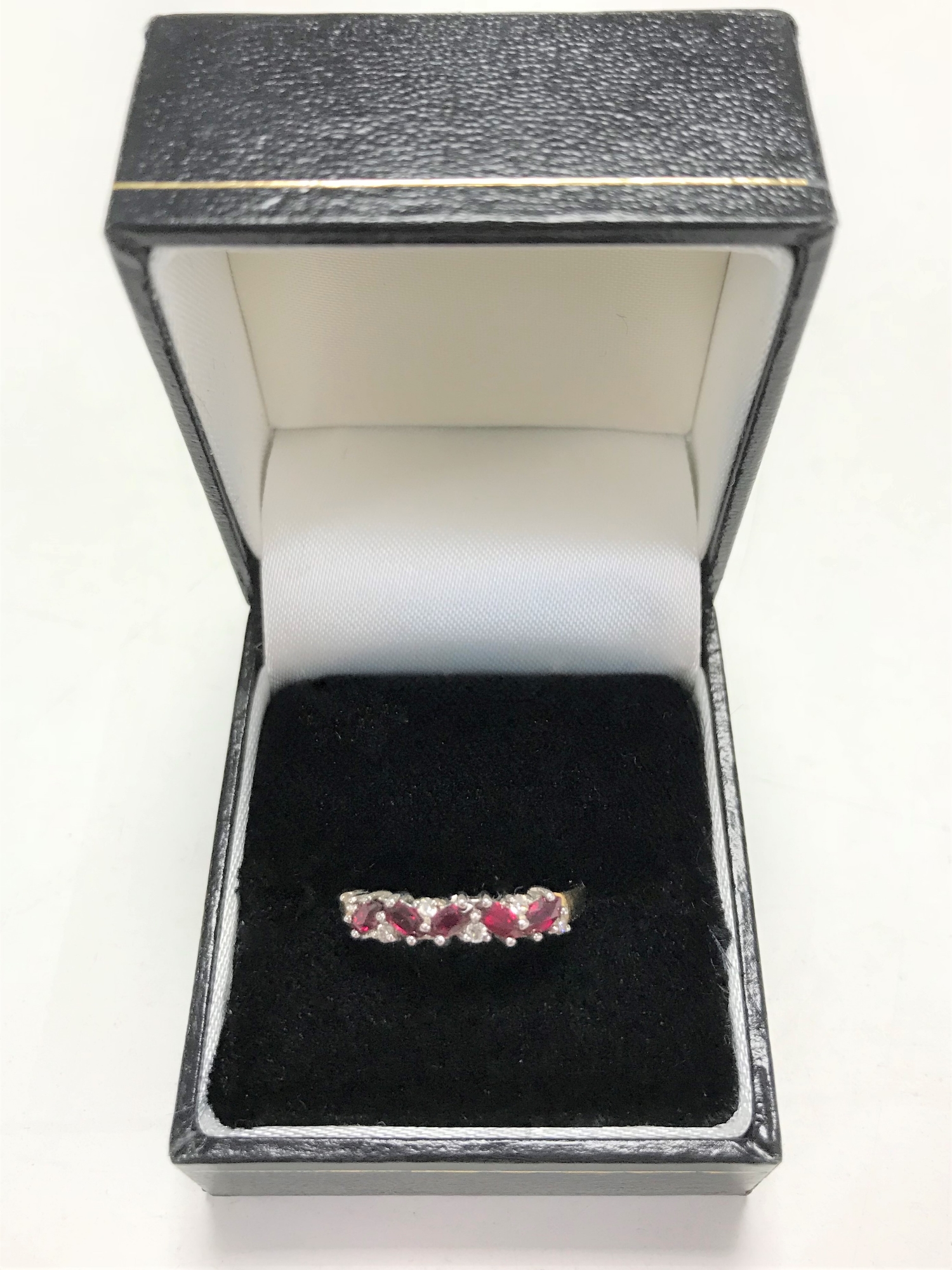 A 14ct gold synthetic ruby ring, size N.