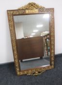 A mahogany framed wall mirror with gilt mounts