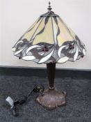 A Tiffany style table lamp together with a lava lamp