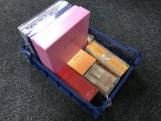 A crate of various perfumes and gift sets,