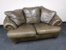 A two seater olive leather Chesterfield settee