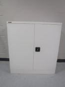 A Dams double door metal stationary cabinet with keys