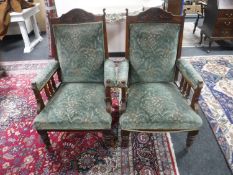 A pair of Victorian mahogany armchairs