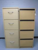 Two wooden four drawer filing cabinets,
