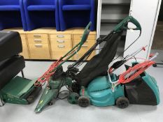 A Bosch electric lawnmower with grass box,