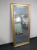 A gilt framed bevel edged hall mirror