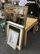 A contemporary square coffee table, together with a gilt framed mirror,