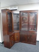 An inlaid mahogany triple section corner display cabinet fitted cupboards beneath