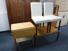 A set of mid twentieth century sliding glass door bookshelves,