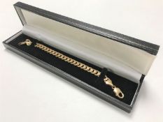 A 9ct gold flat link bracelet, 19.8g.