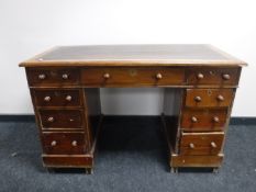 A Victorian mahogany leather topped writing desk,